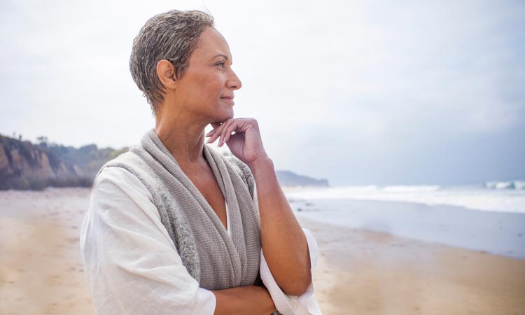 Detaching-From-Depression middle age woman staring at the sea