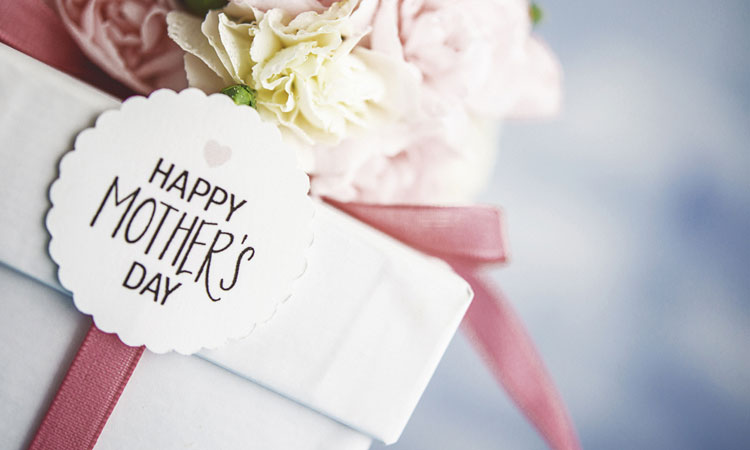 happy-mothers-day gift box with flowers and labels